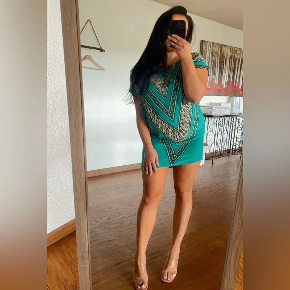 Emerald green printed mini dress